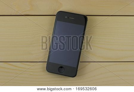 black phone with a beautiful design on the wooden background
