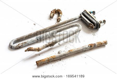 Damaged Heating Element of the Washing Machine on White Background.