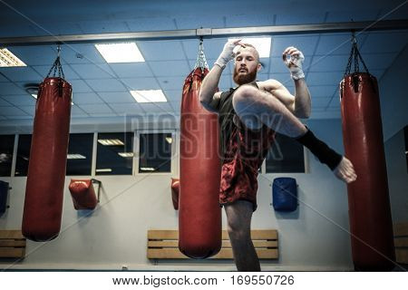 Fighter shadowboxing at gym