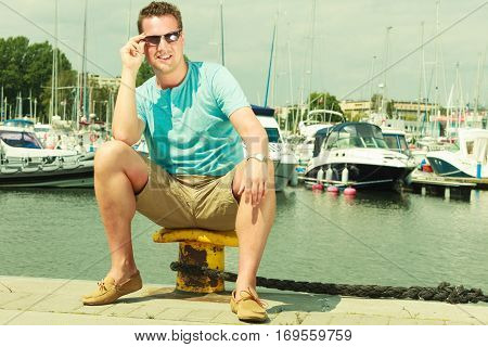 Man Walking On Marina During Summer