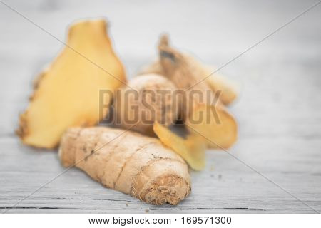Ginger On Wooden Background