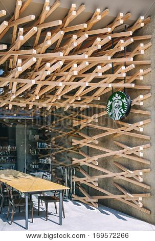 DAZAIFU JAPAN - FEB 20 2012 : Starbuck Coffee shop front display design by Kengo Kuma and associates