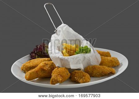 chicken meat breaded fried bread crumbs potatoes salad mayonnaise food cooking harmful diet dinner lunch delicious thick tasty crunchy garnish golden cholesterol lunch eating