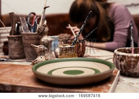 Creative studio potter, Handmade objects on a wooden table