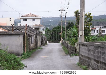 Road of residential area not paved on remote island of Okinawa