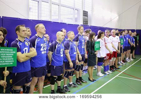MOSCOW, RUSSIA - FEB 17, 2016: Volleyball team stands before game (Volleyball with generalship shoulder loops) in Central Customs Administration