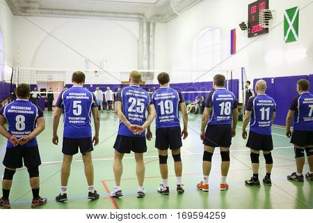 MOSCOW, RUSSIA - FEB 17, 2016: Sportsmen await game (Volleyball with generalship shoulder loops) in Central Customs Administration