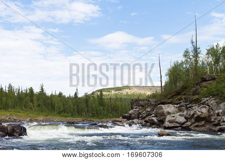 Fantastical cliffs and rapids on the river. Krasnoyarsk territory