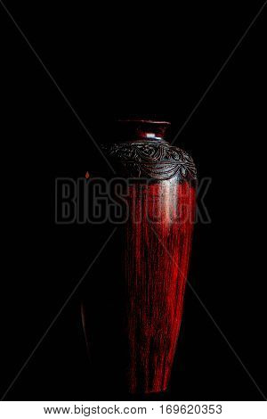 Ancient of vase with a black background.