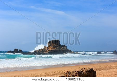 Storm on beautiful Cordoama beach (Algarve Portugal).