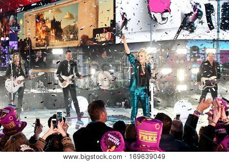 NEW YORK-DEC 31: Recording artist Carrie Underwood performs during Dick Clark's New Year's Rockin' Eve at Times Square on December 31, 2015 in New York City.