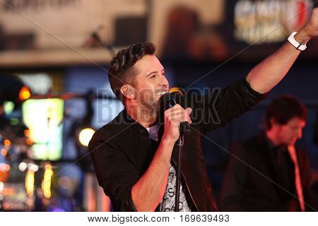 NEW YORK-DEC 31: Recording artist Luke Bryan performs onstage during Dick Clark's New Year's Rockin' Eve at Times Square on December 31, 2015 in New York City.