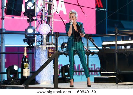 NEW YORK-DEC 31: Recording artist Carrie Underwood onstage during Dick Clark's New Year's Rockin' Eve at Times Square on December 31, 2015 in New York City.
