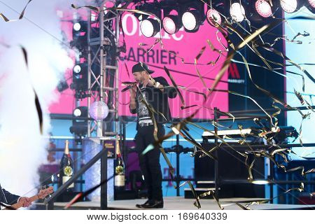 NEW YORK-DEC 31: Recording artist Luke Bryan performs during Dick Clark's New Year's Rockin' Eve at Times Square on December 31, 2015 in New York City.