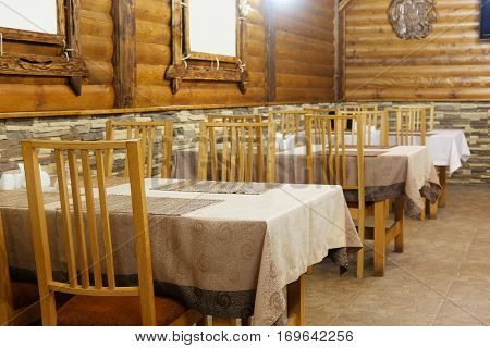 Interior of a cafe in a wooden house