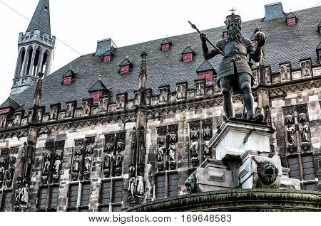 The Aachen Cathedral, also High Aachen Cathedral, or the Aachener Kaiserdom, Germany. The Aachen chapel was the church of coronation for thirty German kings and twelve queens.