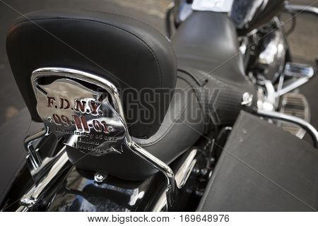NEW YORK - SEPT 11 2016: Customized backrest of a motorcycle seat with FDNY 091101 In Memory Of Our Fallen Brothers cut out in steel in Lower Manhattan on the 15th anniversary of the terror attacks.