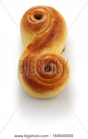 homemade swedish saffron buns, lussekatt isolated on white background
