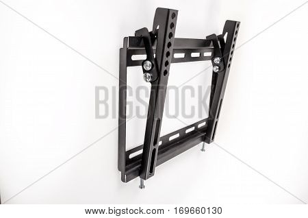 Black bracket for TV on a white background isolation