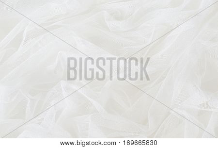 Closeup of white tulle drapery for background