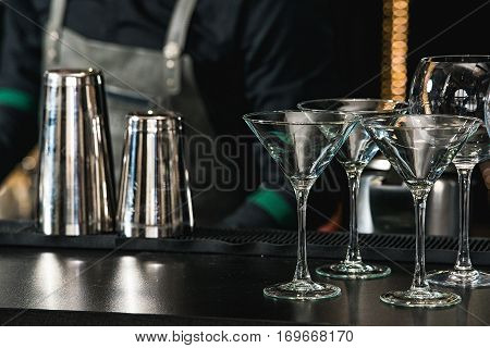 Glasses For A Margarita, Martini, Grog And Liqueur On A Bar At R