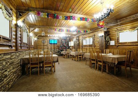 Interior of a cafe in a wooden house
