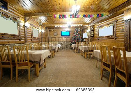 Interior of a cafe in a wooden house