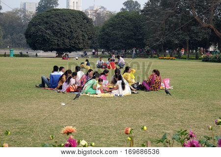 KOLKATA, INDIA - FEBRUARY 08: People relaxing in the Victoria Memorial gardens in Kolkata, India on February 08, 2016.