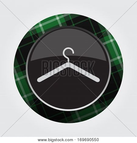 black isolated button with green black and white tartan pattern on the border - light gray clothes hanger icon in front of a gray background