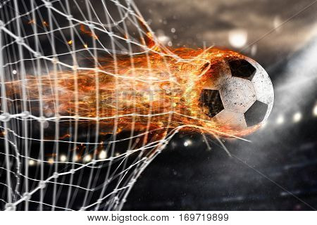 Professional soccer fireball leaves trails of flames and scores a goal on the net