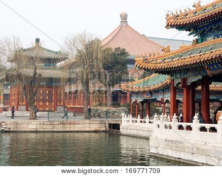 Beijing, China - March 8, 2015: Colorful Pavilions On The North End Of Beihai Park Where Locals Are 
