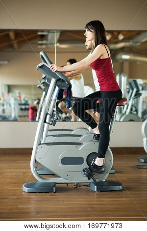 People training on a cyclette