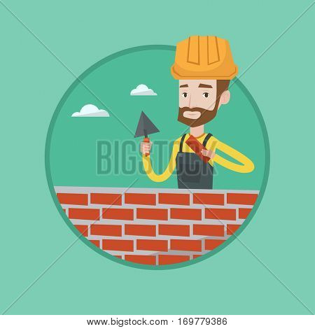 Young bricklayer in uniform and hard hat. Hipster bicklayer with beard working with spatula and brick on construction site. Vector flat design illustration in the circle isolated on background.