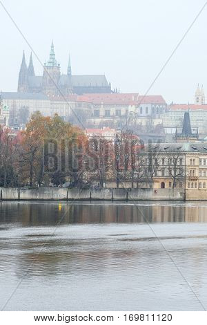 Panorama of an old Prague, bridges and embankment of Vitava river, Czechia