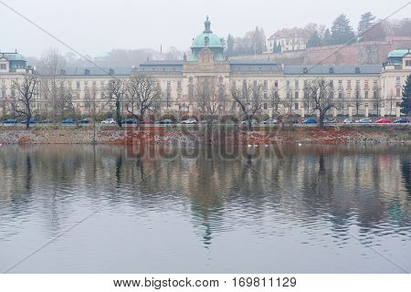 Panorama of an old Prague, bridges and embankment of Vitava river, Czechia