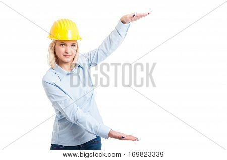 Lady Engineer Wearing Helmet Showing Big Copy Space