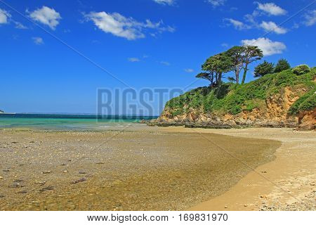 Atlantic coast with cliff and blue sky near Douarnenez Brittany France
