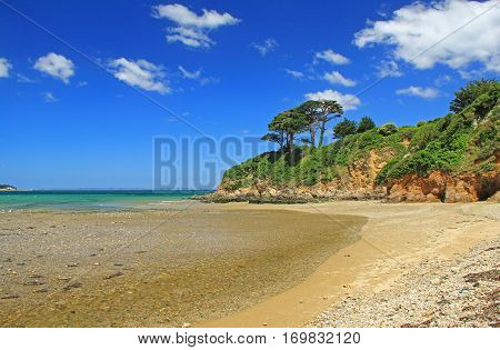 Atlantic coast with cliff and blue sky near Douarnenez Brittany France