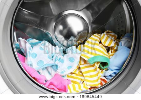 Clothes in washing machine, close up