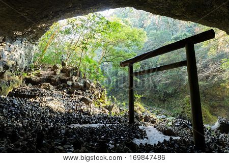 Shinto shrine gateway in the cave