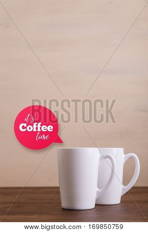 Mock-up mugs. Mockup coffee or tea cups. Its coffee time speech bubble. Design concept for branding. Front view. Wooden rustic board.
