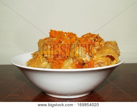 stuffed cabbage is a dish of stuffing wrapped in cabbage leaves.