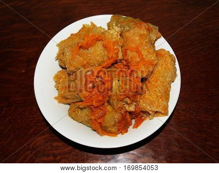 stuffed cabbage is a dish of stuffing wrapped in cabbage leaves.