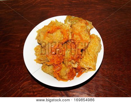 stuffed cabbage is a dish of stuffing wrapped in cabbage leaves.