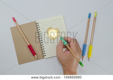 Writer recycled paper notebook open front cover on white background