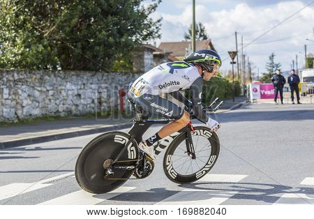 Conflans-Sainte-HonorineFrance-March 62016: The South African cyclist Jacques Janse van Rensburg of Dimension Data Team riding during the prologue stage of Paris-Nice 2016.