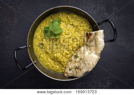 Indian Dal Soup with Naan Bread in Bowl