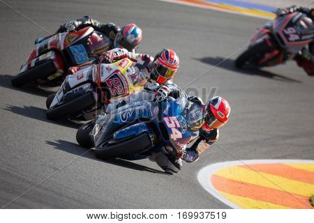 VALENCIA, SPAIN - NOV 13: 54 Pasini, 22 Lowes, 23 Schrotter in Moto2 Race during Motogp Grand Prix of the Comunidad Valencia on November 13, 2016 in Valencia, Spain.