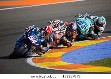 VALENCIA, SPAIN - NOV 13: 54 Pasini, 94 Folger, 52 Kent in Moto2 Race during Motogp Grand Prix of the Comunidad Valencia on November 13, 2016 in Valencia, Spain.