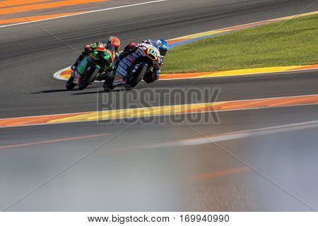 VALENCIA, SPAIN - NOV 13: Moto3 race during Motogp Grand Prix of the Comunidad Valencia on November 13, 2016 in Valencia, Spain.